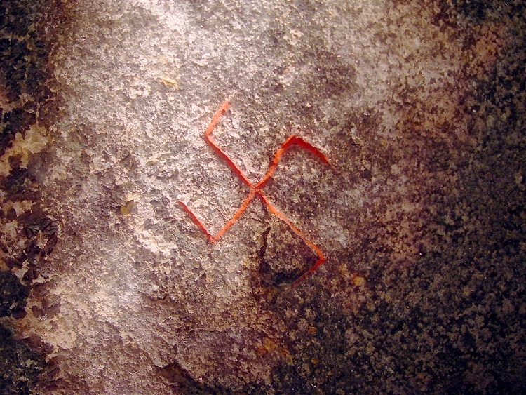 Swastika carved into the Snoldelev Stone from the 9th century. It was used over a thousand years before Nazi Germany existed.