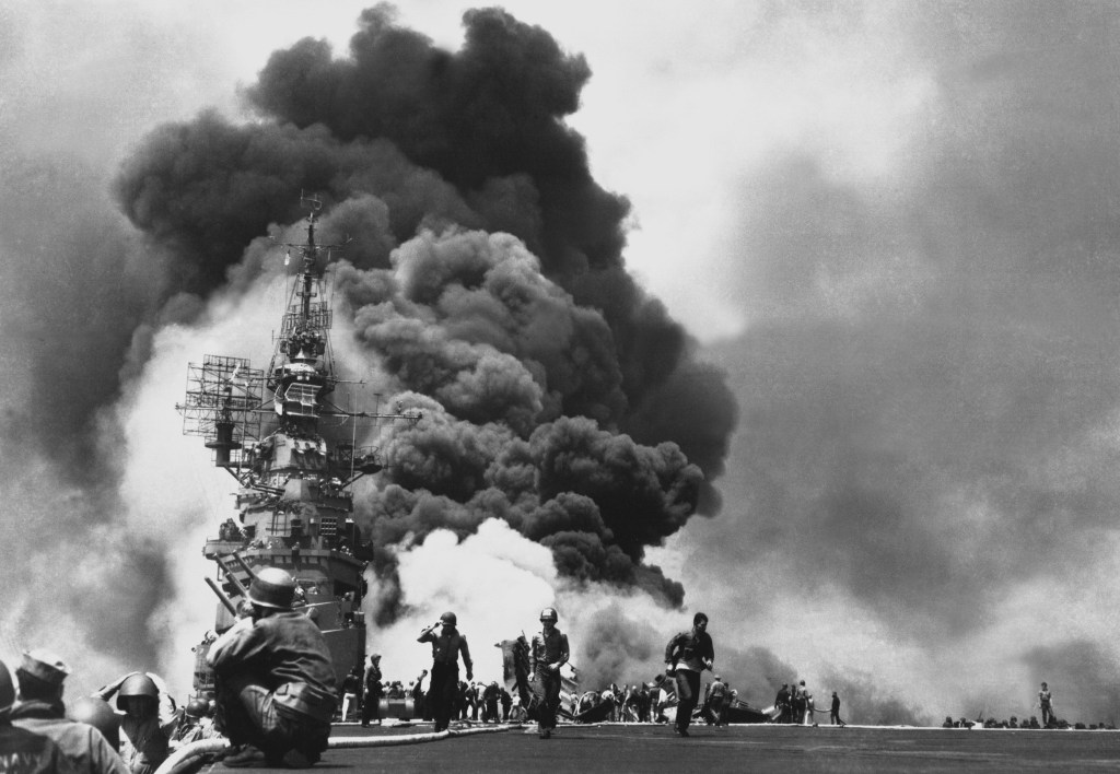 Scene on the USS Bunker hill on fire after it was hit by Kamikazes in May 1945.