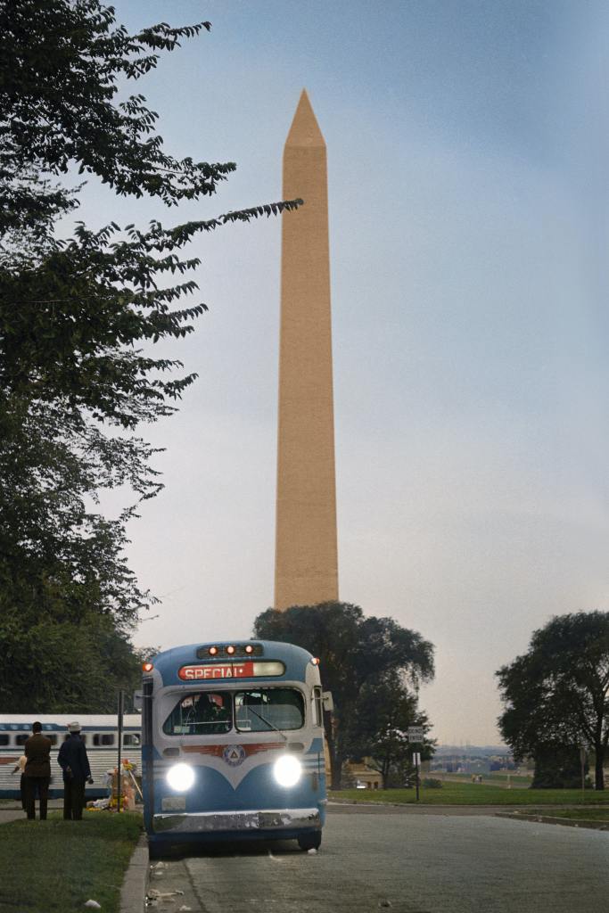 A bus near the Washington Monument leaving after the Civil Rights March on Washington, the evening of August 28th, 1963.