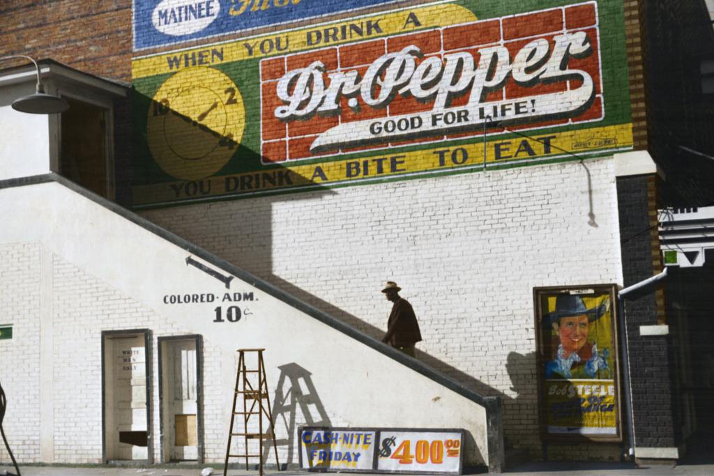 A man walking into the movie house on a Saturday afternoon using the "colored" entrance in Belzoni, Mississippi, October 1939.