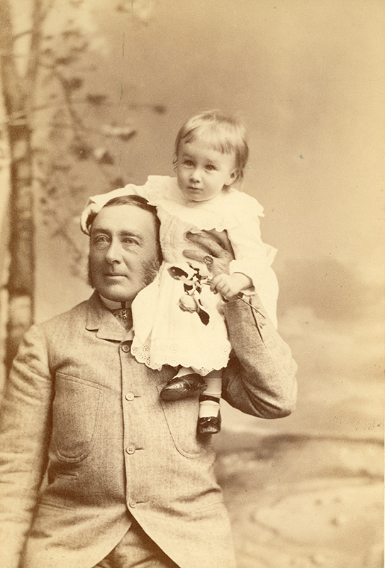 Franklin D. Roosevelt at the age of 16 months sitting on his fathers shoulder.