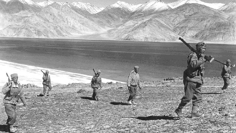 Rifle-toting Indian soldiers on patrol during the brief, bloody 1962 Sino-Indian border war.