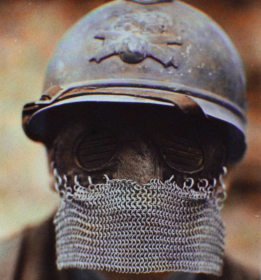 Soldier wearing a World War I chainmail Splatter Mask HistoryColored