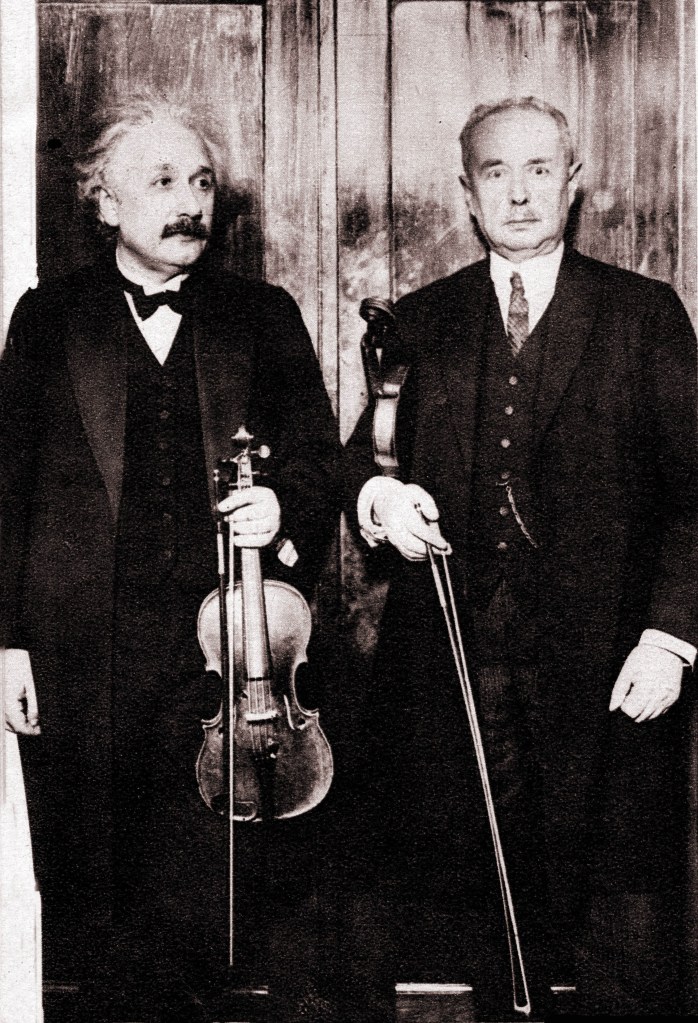 Einstein with his violin teacher 1930
