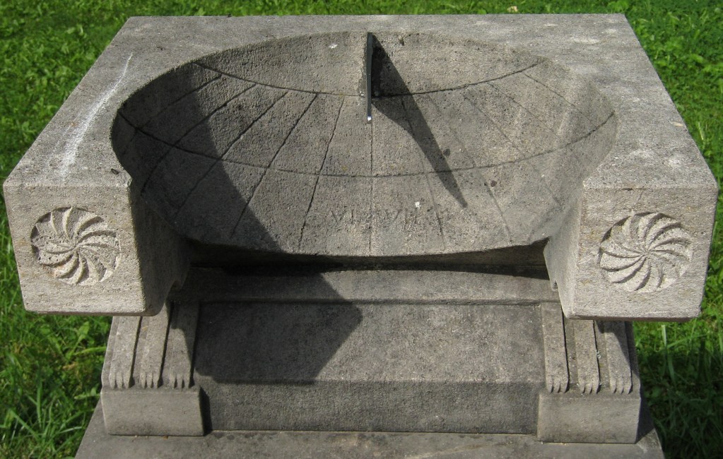 a stone roman basin sundial