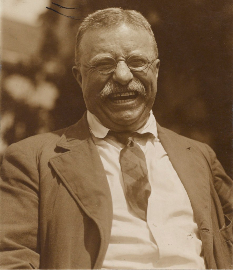 Theodore Roosevelt laughing