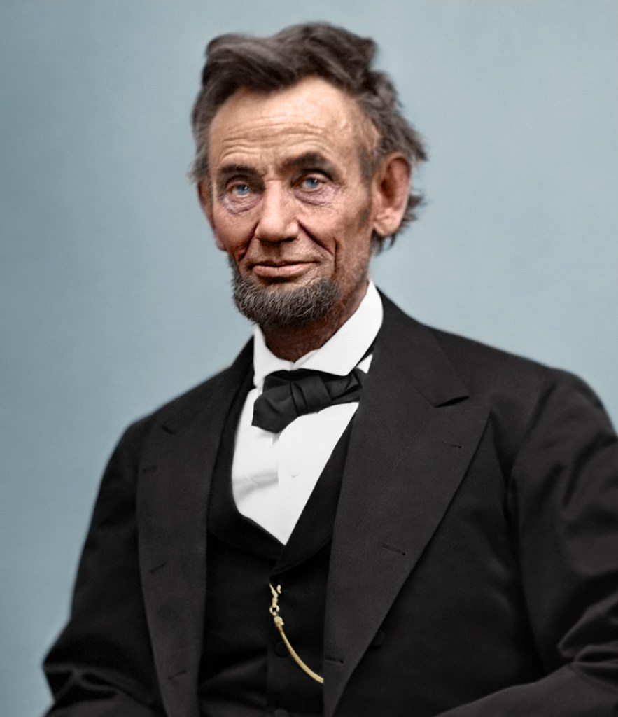 Color Photograph of Abraham Lincoln in a suit taken on February 1865. The photo has been colroized.