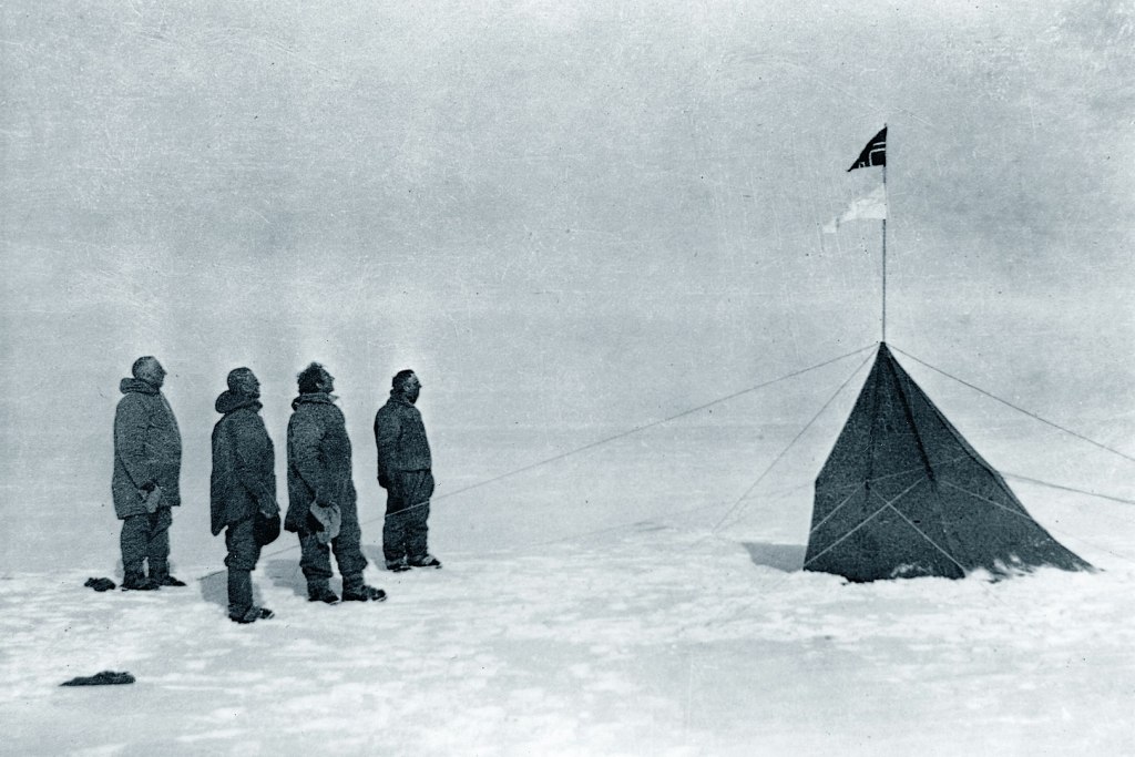 Members of Roald Amundsen's South Pole expedition 1910s at the pole itself, December 1911, (from left to right): Roald Amundsen, Helmer Hanssen, Sverre Hassel and Oscar Wisting