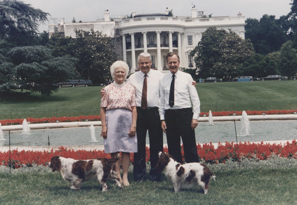 President and Mrs. Bush show Russian President Boris Yeltsin the South Grounds of the White House and stop at the south fountain to pose for a photograph