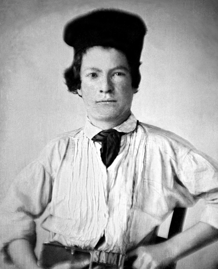Portrait of Samuel Clemens as a young man holding a printer's composing stick with letters SAM. 