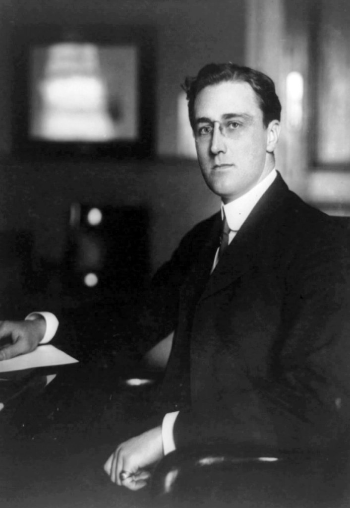 Franklin Delano Roosevelt, three-quarter length portrait, seated, facing left as Asst. Sect. of the Navy.