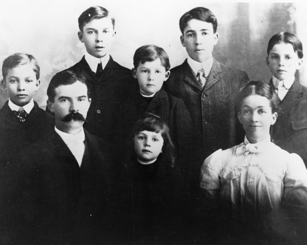 1902 - Eisenhower family photo. - Front Row Left to Right: David, Milton, Ida - Back Row Left to Right: Dwight, Edgar, Earl, Arthur, Roy.