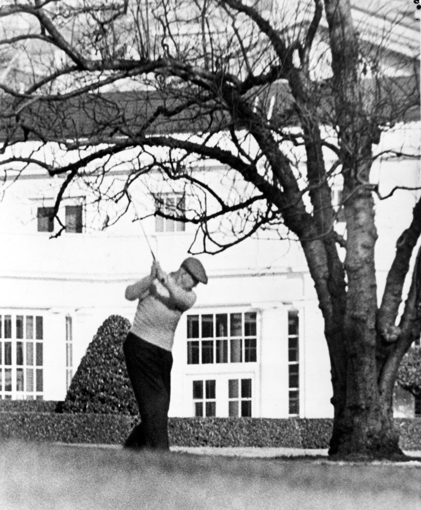 President Dwight Eisenhower Swings a Golf Club on the South Lawn of the White House, 12/2/1959