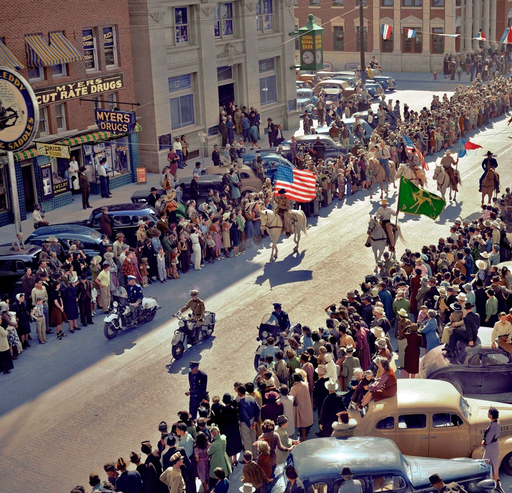 Colorized photograph of the San Angelo Fat Stock Show Parade taking place in San Angelo, Texas, United States