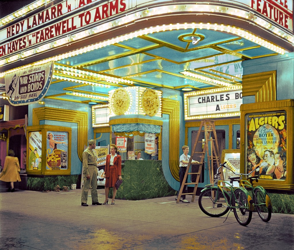Colorized photo of Sergeant George Camblair taking his girlfriend to the movies while he is at home on a weekend furlough