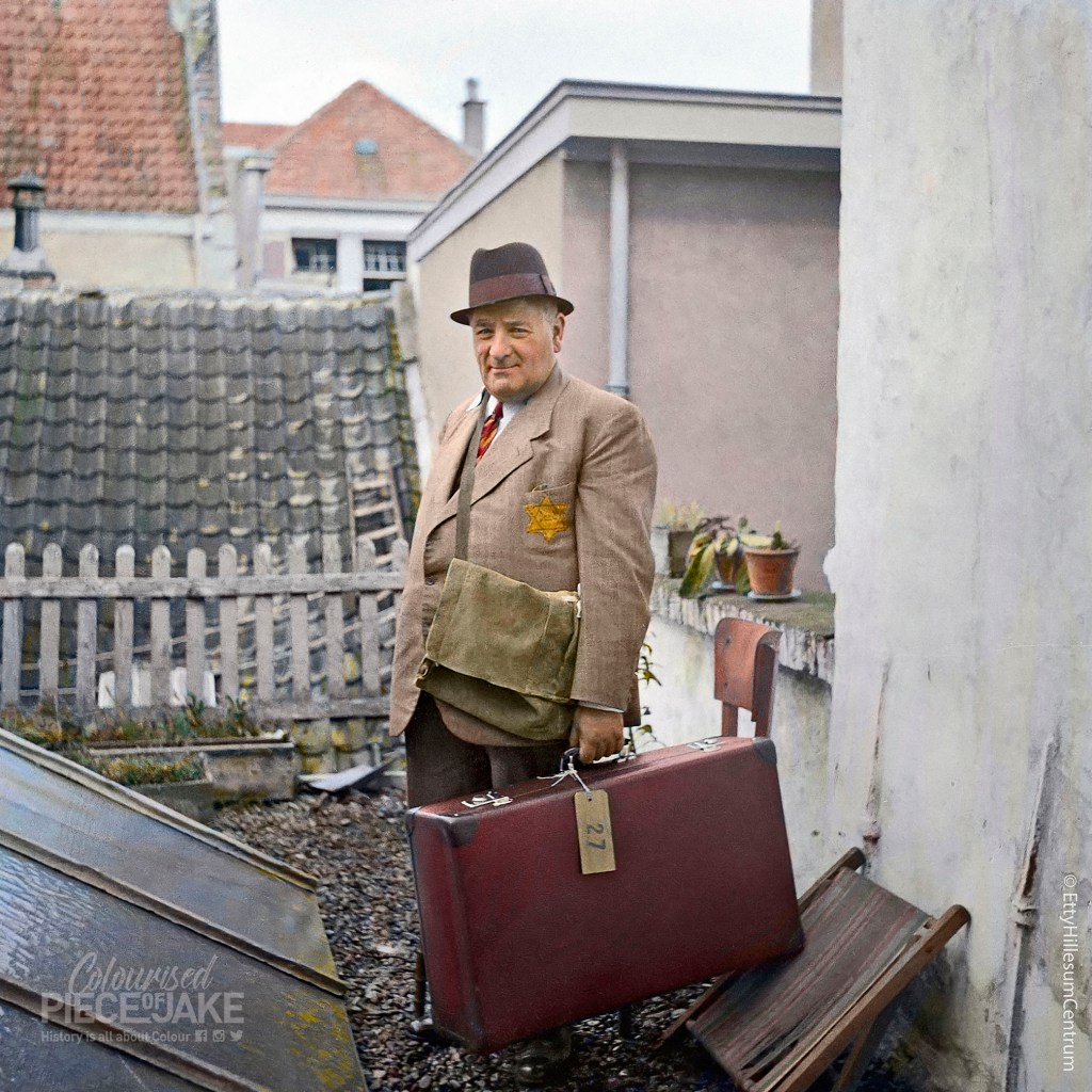 Sam Noach is packing his suitcase on the roof terrace of his house in the Nieuwstraat in Deventer, just before being transported to a labor camp, August 1942. Colorized by Colourised Piece of Jake