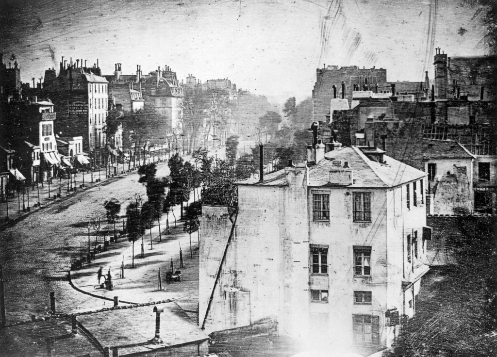 Boulevard du Temple taken by Louis Daguerre which is the first photograph of a person ever taken.