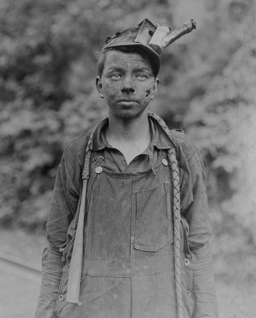 Original Description: Young Driver in Mine: Had been driving one year. (7 A.M. to 5:30 P.M. Daily) Brown Mine, Brown, W. Va. Location: Brown, West Virginia.