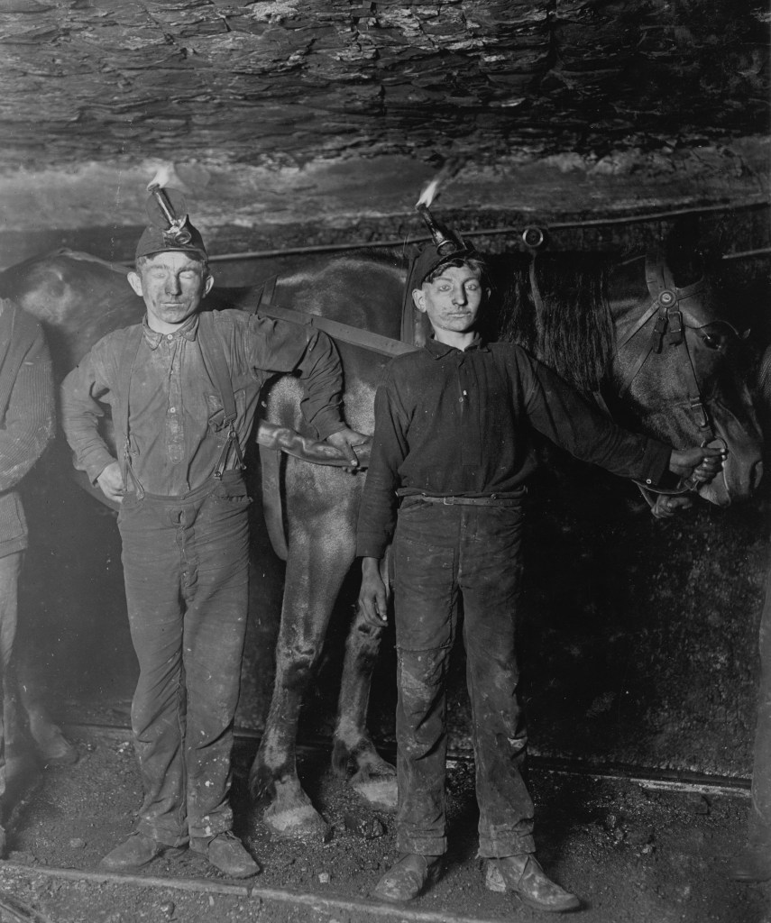 Original description from the National Child Labor Committee: Drivers in a Coal Mine Co. Plenty boys driving and on tipple. No trappers used, as mine is ventilated by another system. Location: West Virginia.