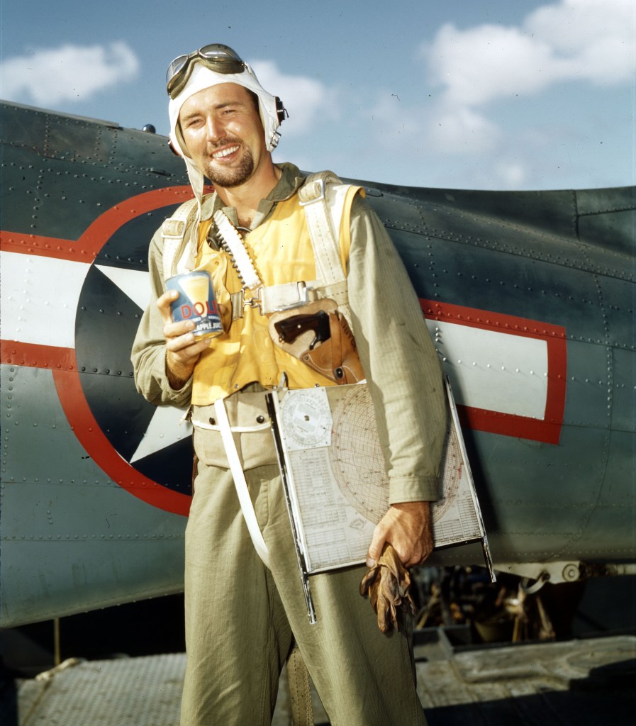 F.J. Jayce, USN Pilot, Drinks Fruit Juice Before Going Aloft, USS Yorktown (CVA-10)

Original Color Photo of a pilot during WW2
